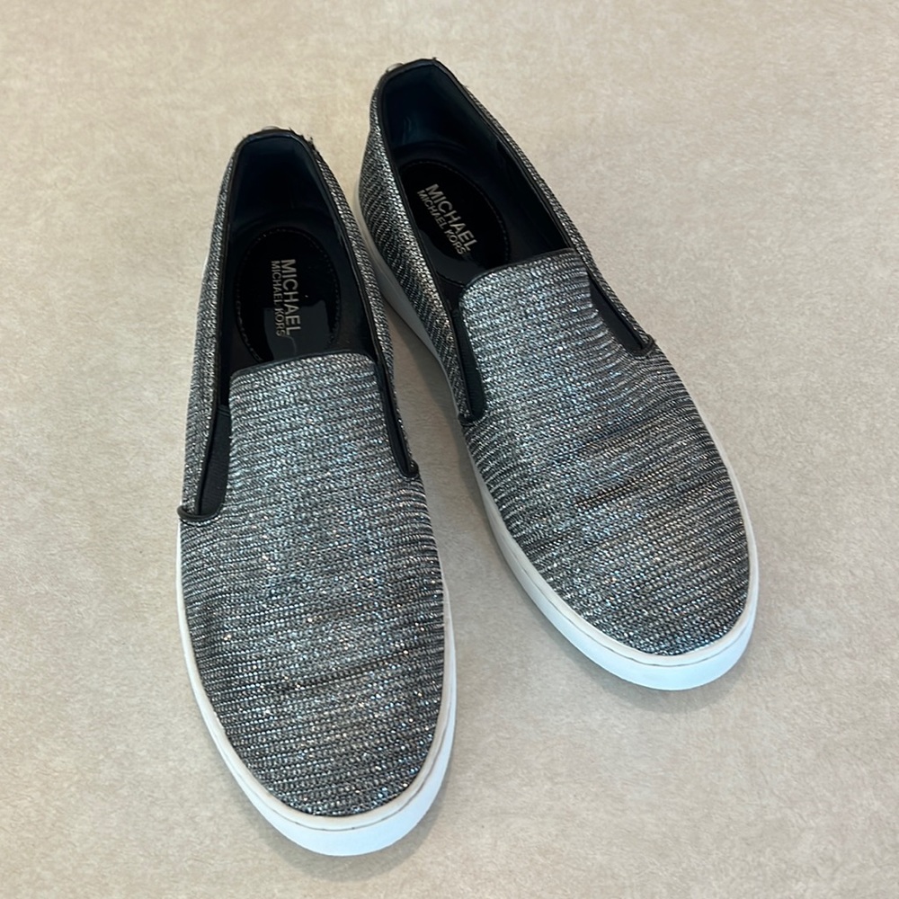 Michael Kors size 9 women’s silver metallic slip on sneaker. Smoke free.